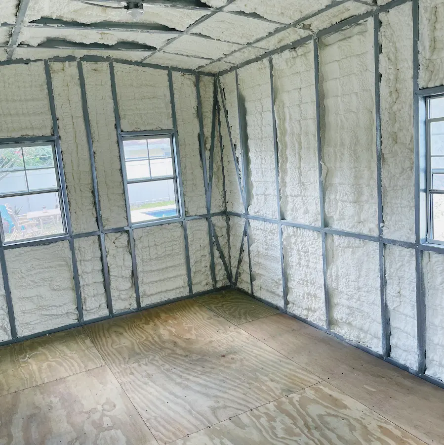 Closed-cell spray foam insulation applied to wall cavities in a residential project in Walden